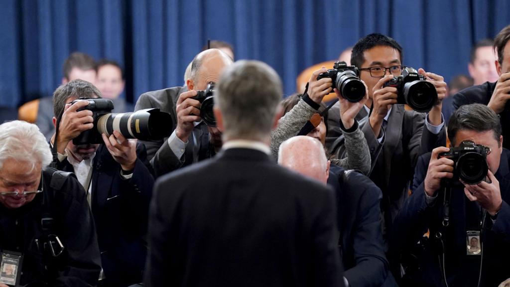 Bill Taylor faces the cameras