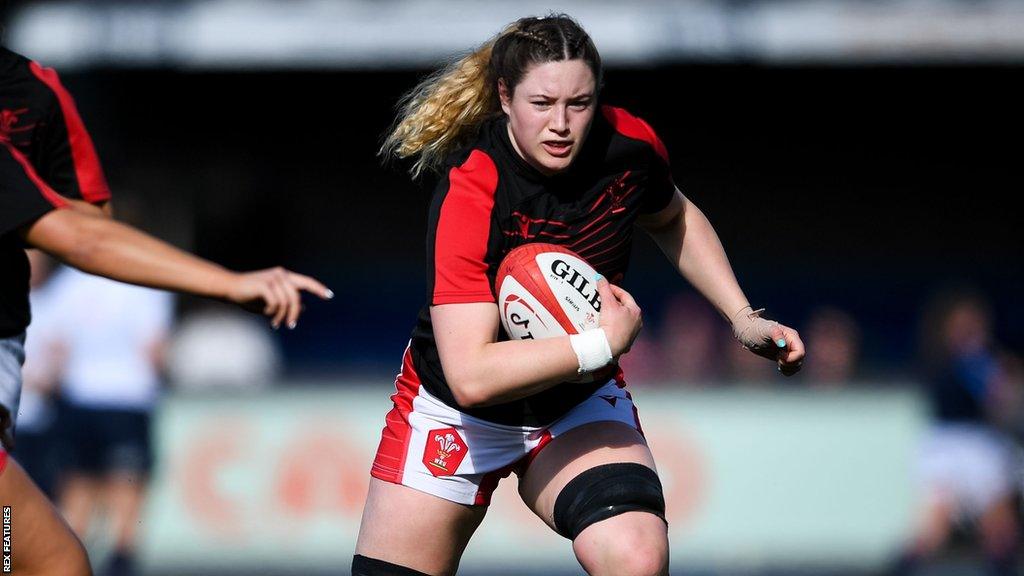 Gwen Crabb playing for Wales