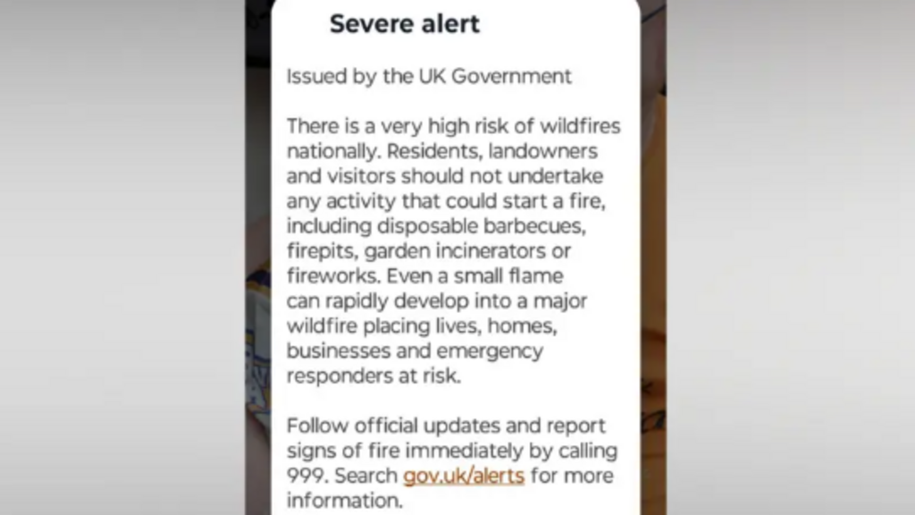 A warning of very high risk of wildfires seen on a phone.