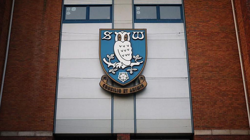 Sheffield Wednesday's club badge on the side of Hillsborough Stadium