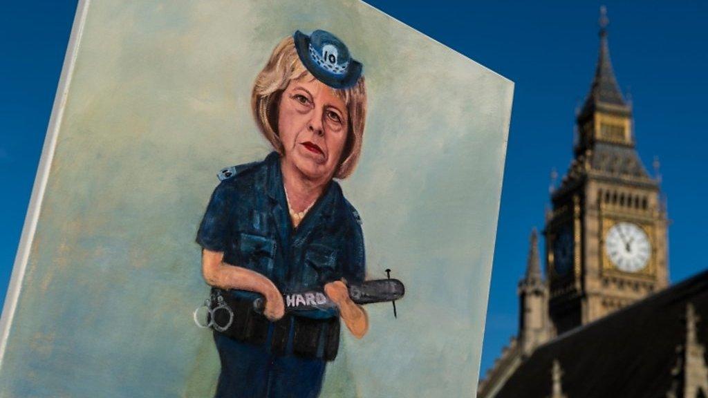 Theresa May with truncheon