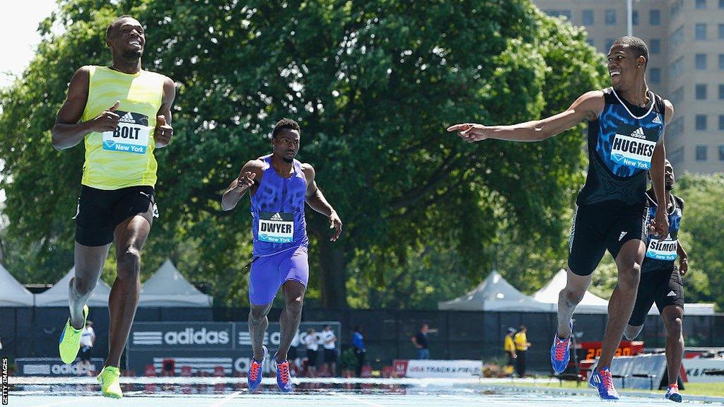 Zharnel Hughes competes against Usain Bolt in New York in 2015