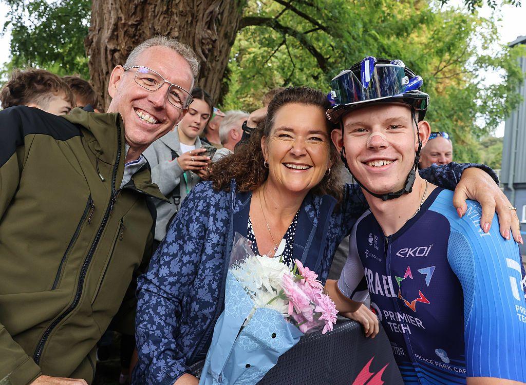 Fin Tarling with mum Dawn and dad Michael at the Tour of Britain last year