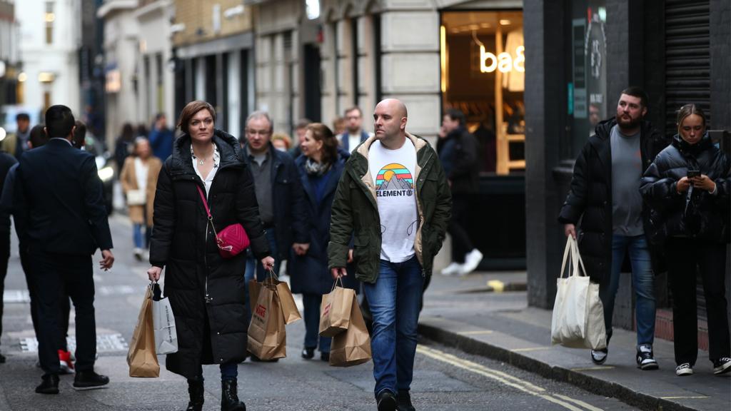 Shoppers walk through Soho on 29 January 2022 in London