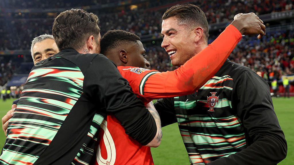  Cristiano Ronaldo and Nuno Mendes of Portugal celebrate victory 