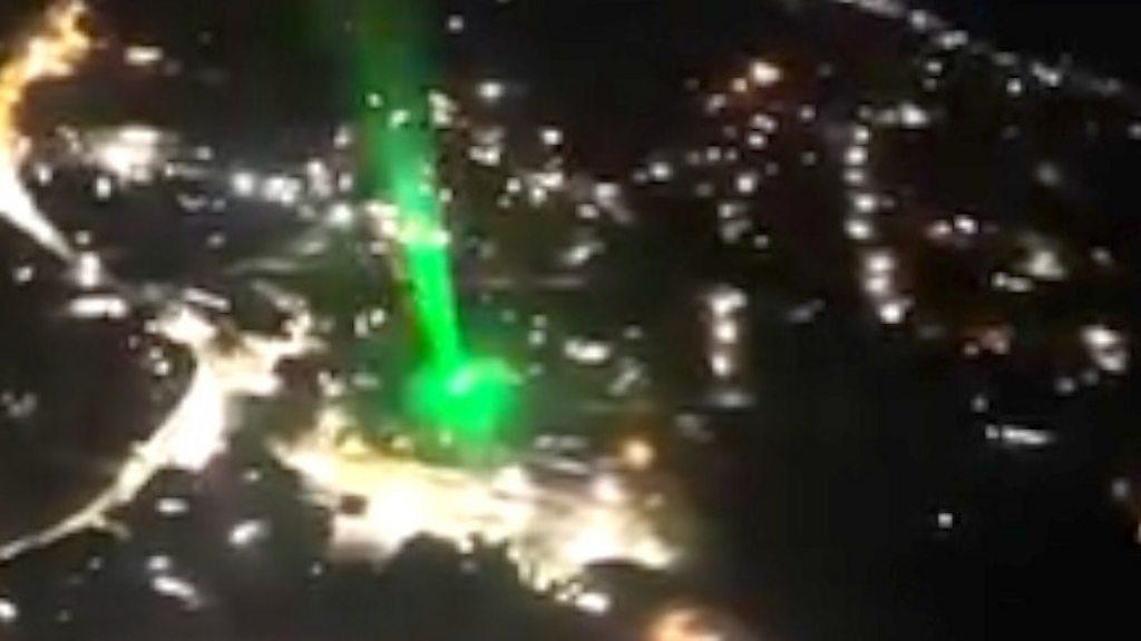 Laser being shone at an air ambulance.