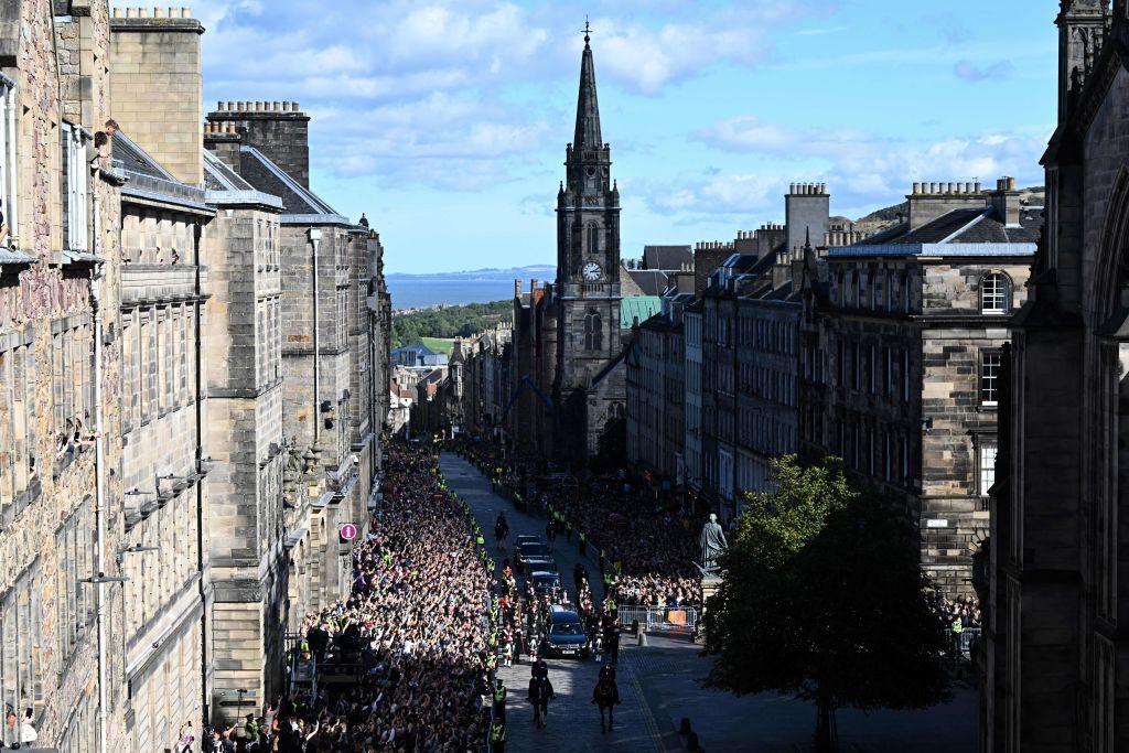 The procession moving along the Royal Mile, Edinburgh.