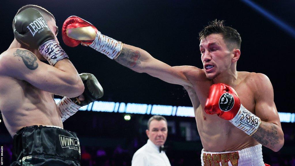 Liam Davies throws a right hand punch in his fight against Italy's Vicenzo La Femina