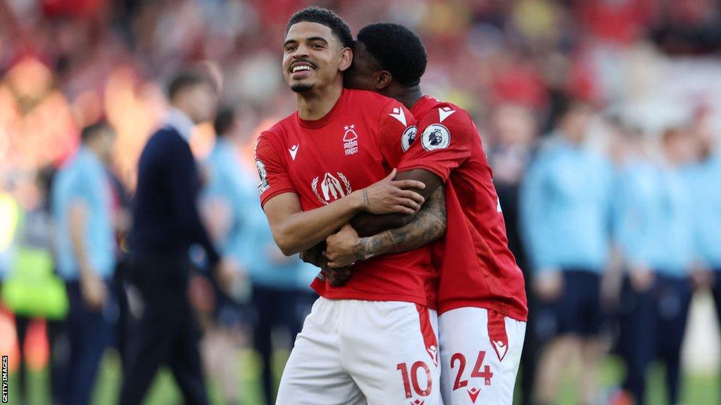 Morgan Gibbs-White is embraced by Serge Aurier after Nottingham Forest's 1-0 win over Arsenal