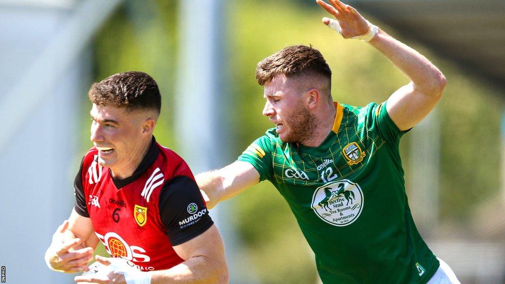 Down's Daniel Guinness attempts to get away from Meath's Jack O'Connor in the Tailteann Cup group-stages contest between the counties last month