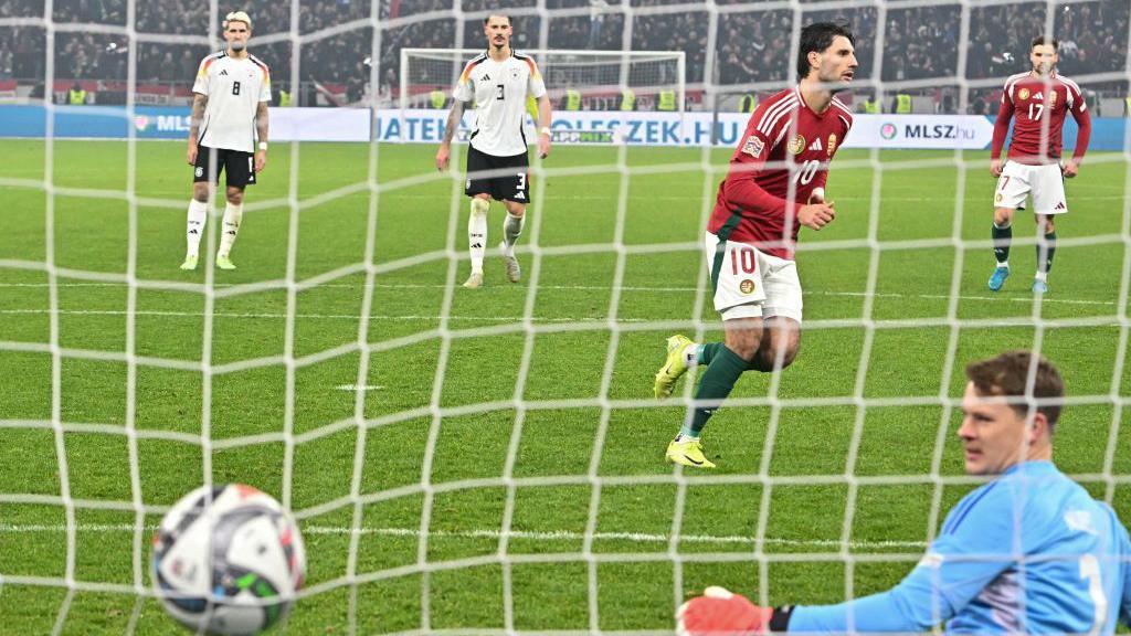 Dominik Szoboszlai scores a penalty for Hungary