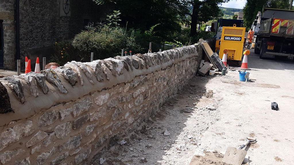 A section of the newly rebuilt retaining wall