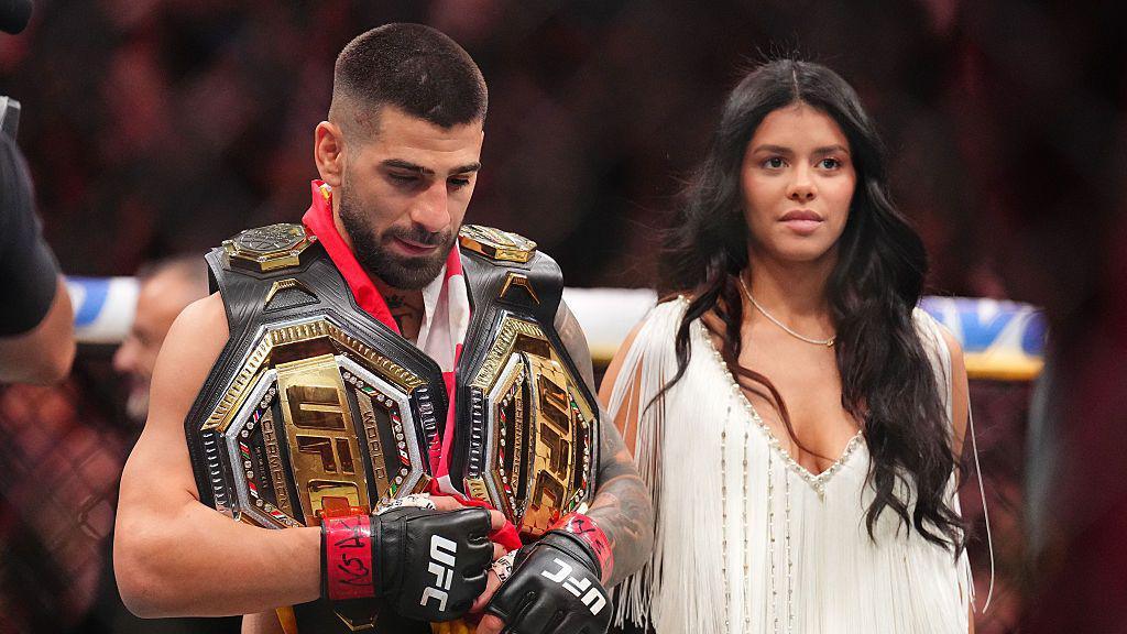 Ilia Topuria holding two titles after beating Charles Oliveira at UFC 317