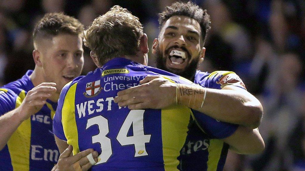 Ben Westwood congratulates Ryan Atkins (right) after the Warrington centre had scored the first of his two tries against Leeds