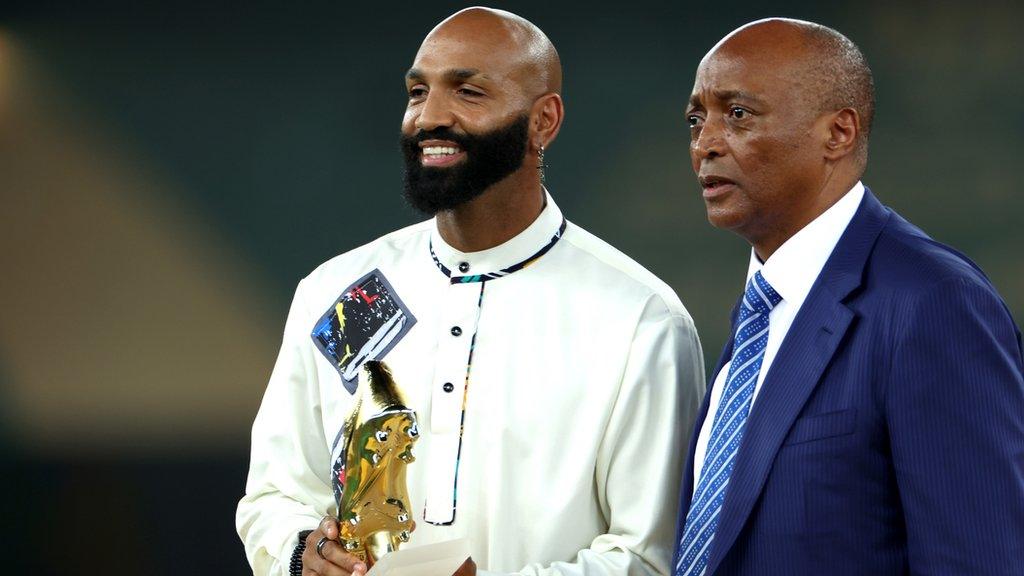 Equatorial Guinea striker Emilio Nsue with the Confederation of African Football president Patrice Motsepe after being awarded the Africa Cup of Nations 2023 golden boot