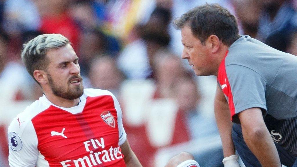 Aaron Ramsey receives treatment