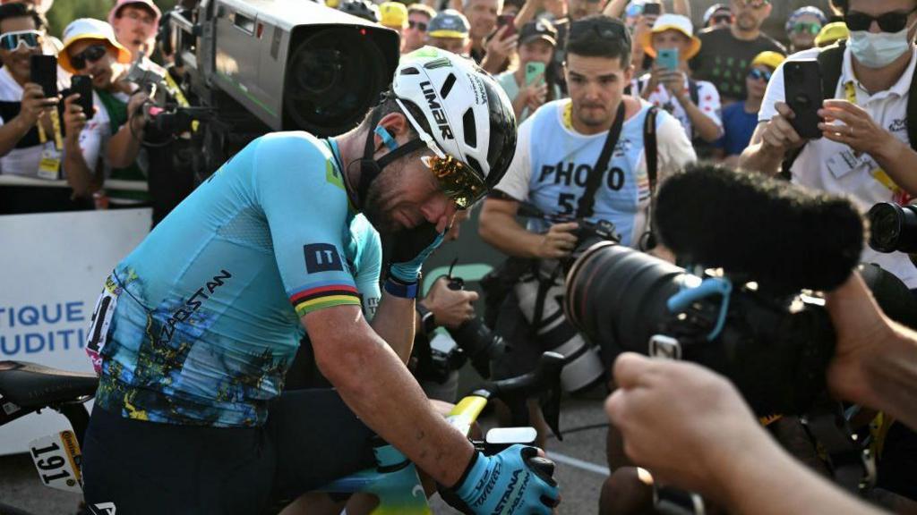 Cavendish, wearing a special jersey to mark his record 35 Tour de France stage wins, crossed the finish line in tears on Col de la Couillole  