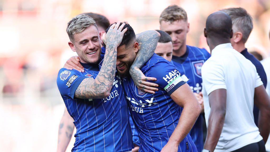 Sam Morsy of Ipswich Town celebrates a draw with team-mate Sam Szmodics after the Premier League match between Southampton FC and Ipswich Town FC at St Mary's Stadium