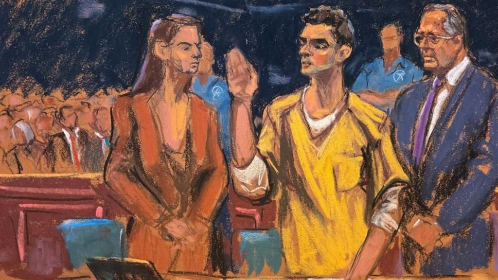 Luigi Mangione is sworn in for a hearing in his federal murder trial at Manhattan Criminal Court in New York City in this court sketch