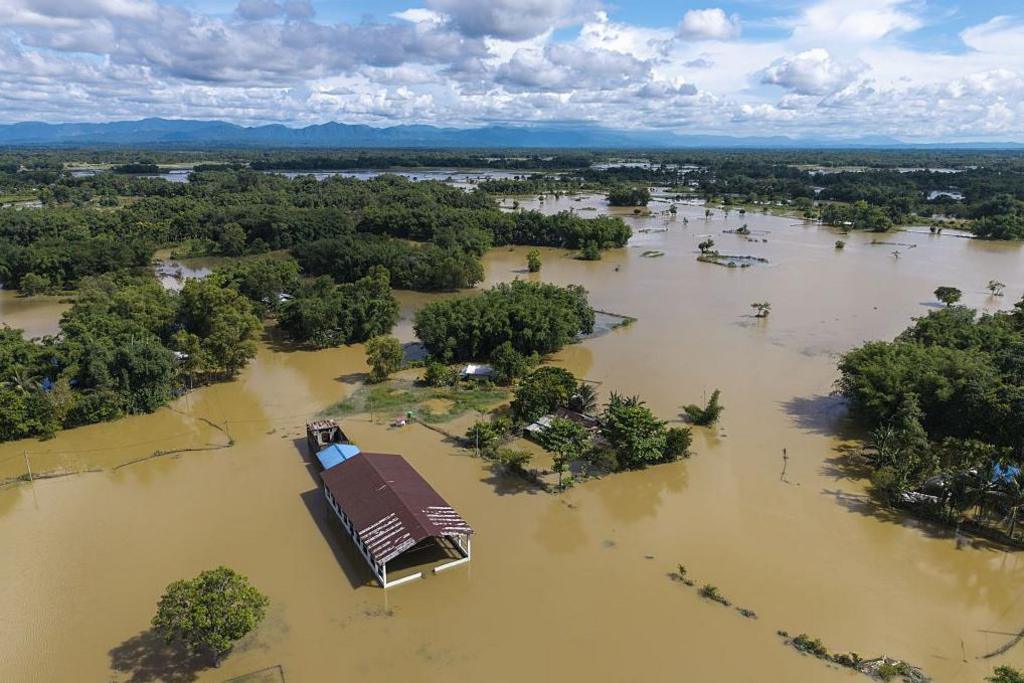 An aerial view of vast areas submerged by floodwaters following heavy monsoon rains, on July 22, 2026 in Jorhat, India. The flood situation in Assam remained critical, with more than 630,000 people affected across 21 districts. 