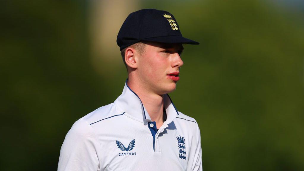 Rocky Flintoff wearing the England shirt and cap