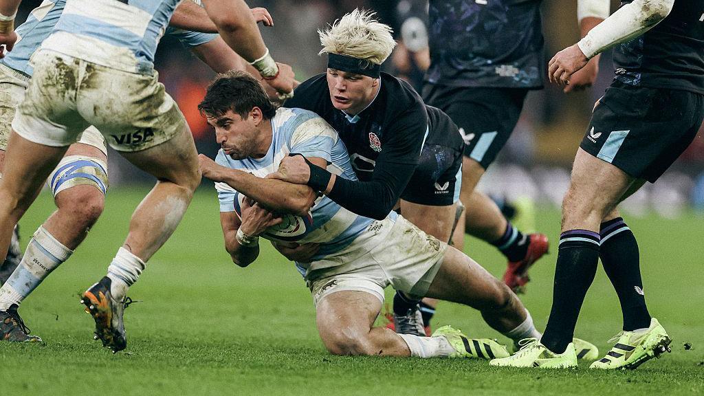 Henry Pollock makes a tackle