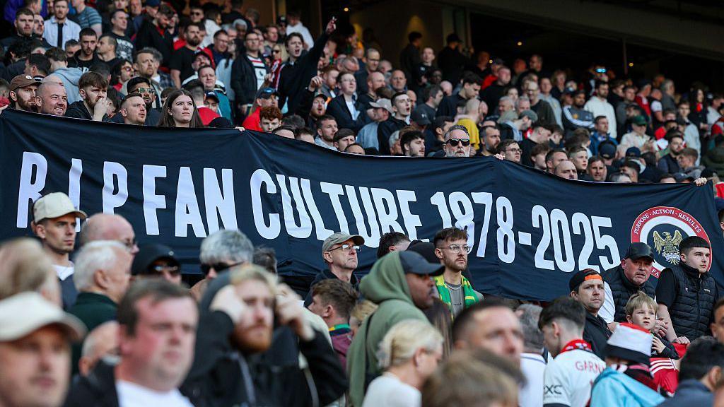 Manchester United supporters protesting