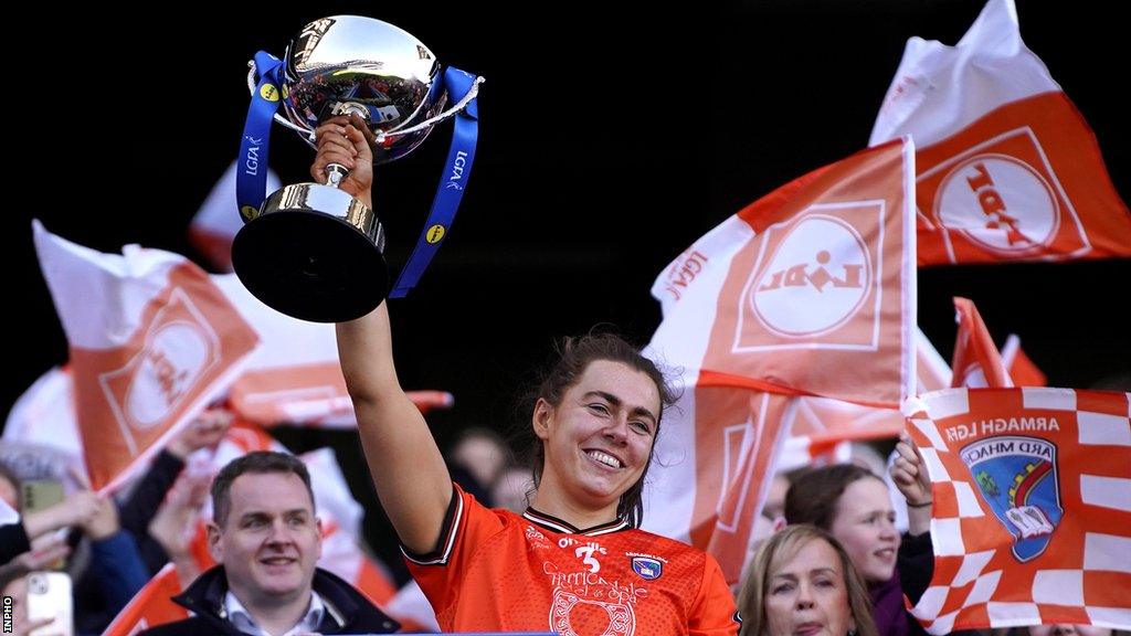 Armagh defender Clodagh McCambridge lifts the Division One trophy at Croke Park