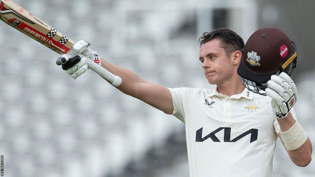 Jamie Smith celebrates scoring a century for Surrey against Middlesex