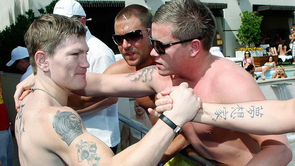 Ricky Hatton shakes the hand of some of his fans at a pool party in Las Vegas