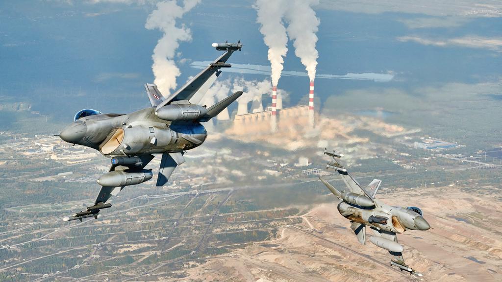 F-16 fighter jets takes part in a Nato exercise near the air base in Lask, central Poland, 12 October 2022