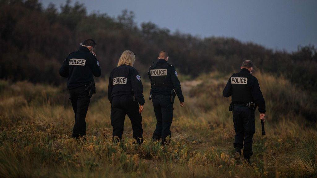 French Police patrol an area on the beach of Gravelines, near Dunkirk, on September 2020