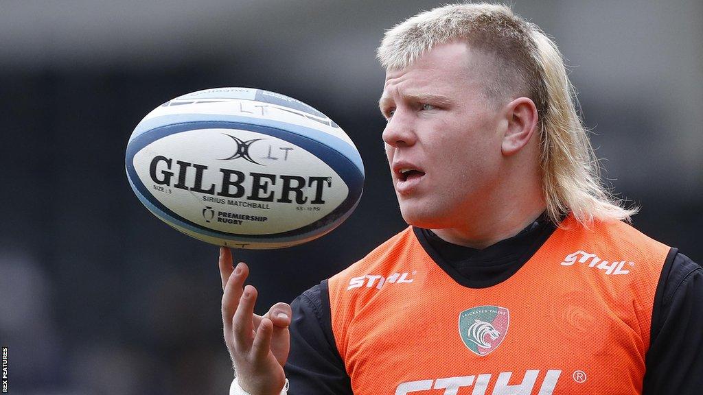 Leicester Tigers' Nic Dolly spins a rugby ball on his finger