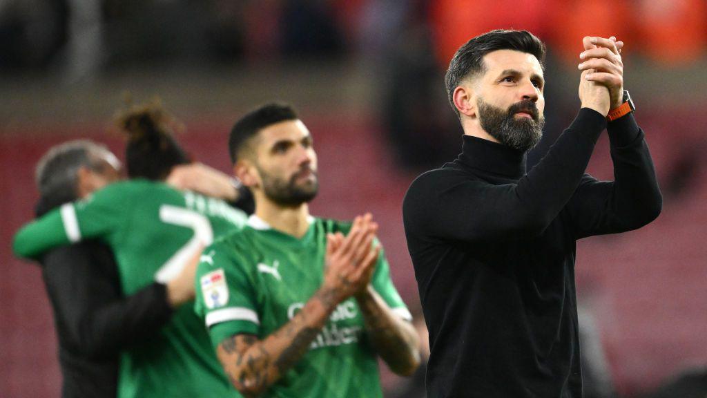 Plymouth head coach Miron Muslic applauds the fans 