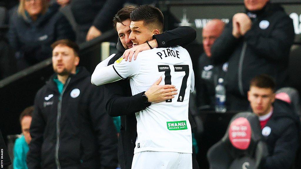 Joel Piroe embraces Swansea boss Russell Martin