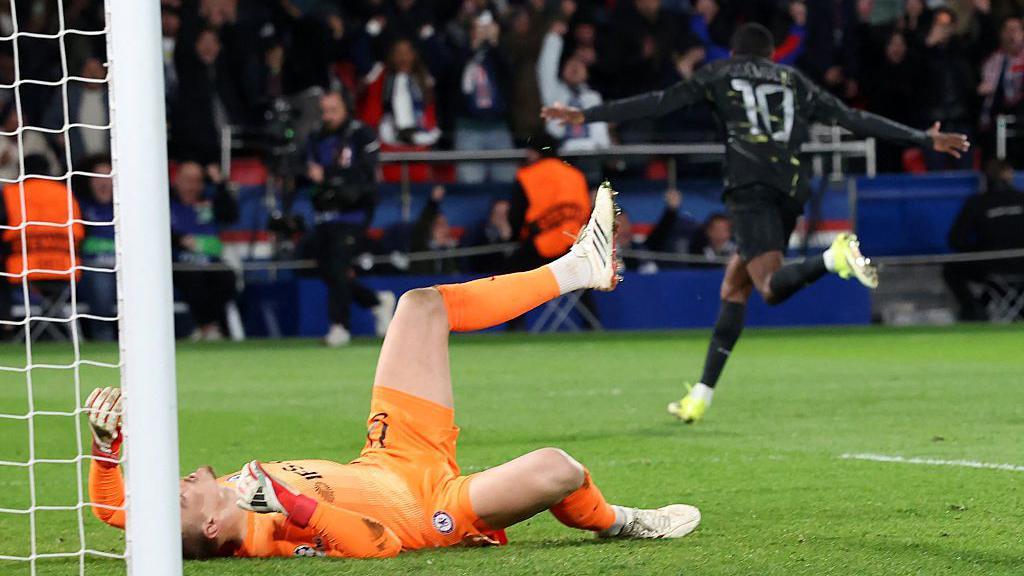 Filip Jorgensen reacts after conceding his side's second goa