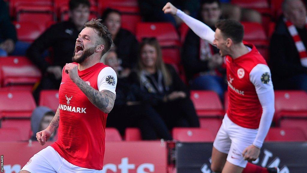 Celebration time for Larne striker Andy Ryan after scoring against Cliftonville