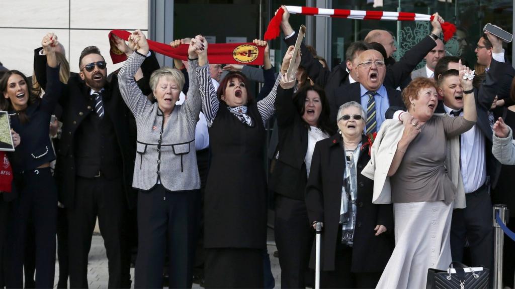 Relatives of the victims outside court