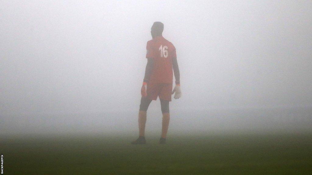 Ibrahim Sesay, goalkeeper of Sierra Leone, looks on in the fog during the 2026 Fifa World Cup qualifier against Ethiopia in El Jadida