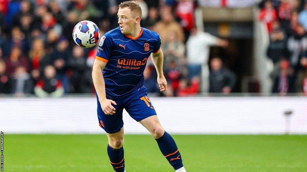 Northern Ireland's Shayne Lavery in action for Blackpool