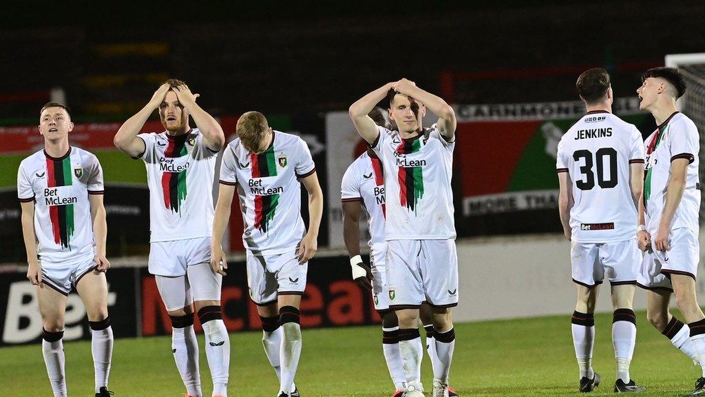 Disappointment for Glens players after losing out on penalties at the Oval