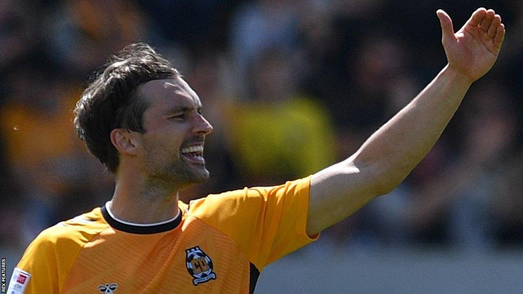 Harrison Dunk in action for Cambridge United