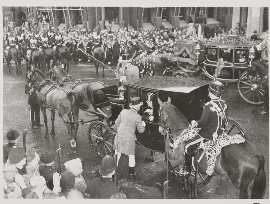 Whose Fault, The driver of Winston Churchill 's coach at the coronation, Capt. Frank Gilbey, has raised his voice to start off a controversy about the Prime Minister 's action in ordering the coach back To No 10 Downing Street after it had lost it 's place in the procession on June 2. Capt Gilbey hotly denies that his handling of the horses had anything to do with the mixup but spectators agree that the coach had lost it 's place. The incident, which happened outside Canada house was pictured exclusively by Federal Staff photographer James Lynch, who heard Churchill instruct Gilbey to withdraw from the procession, London, England