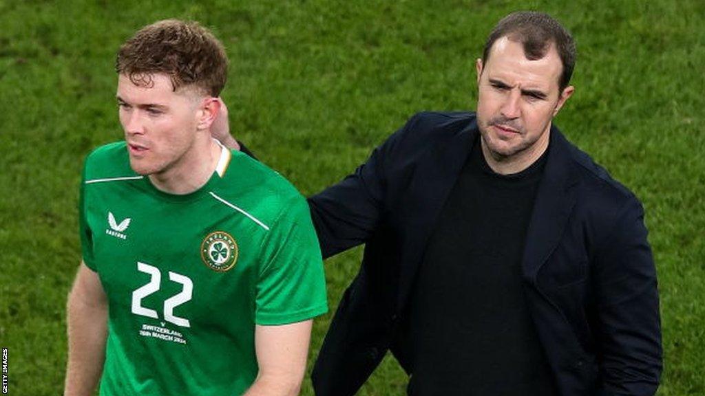 Nathan Collins is consoled by John O'Shea after Tuesday night's defeat by Switzerland