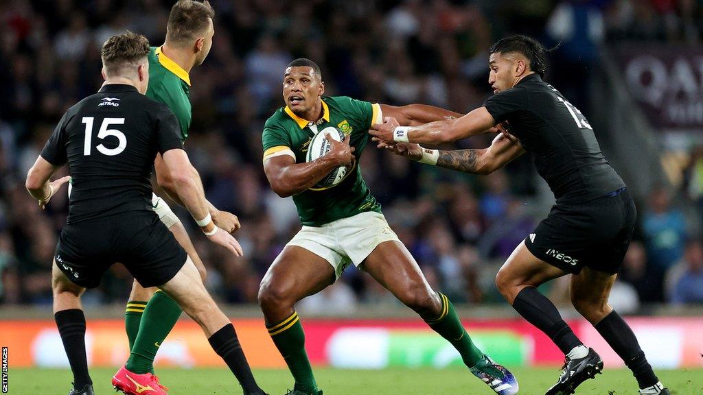 Damian Willemse takes on New Zealand