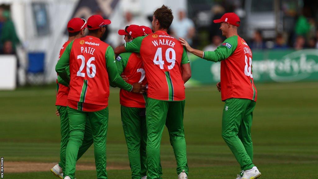 Leicestershire players celebrate wicket