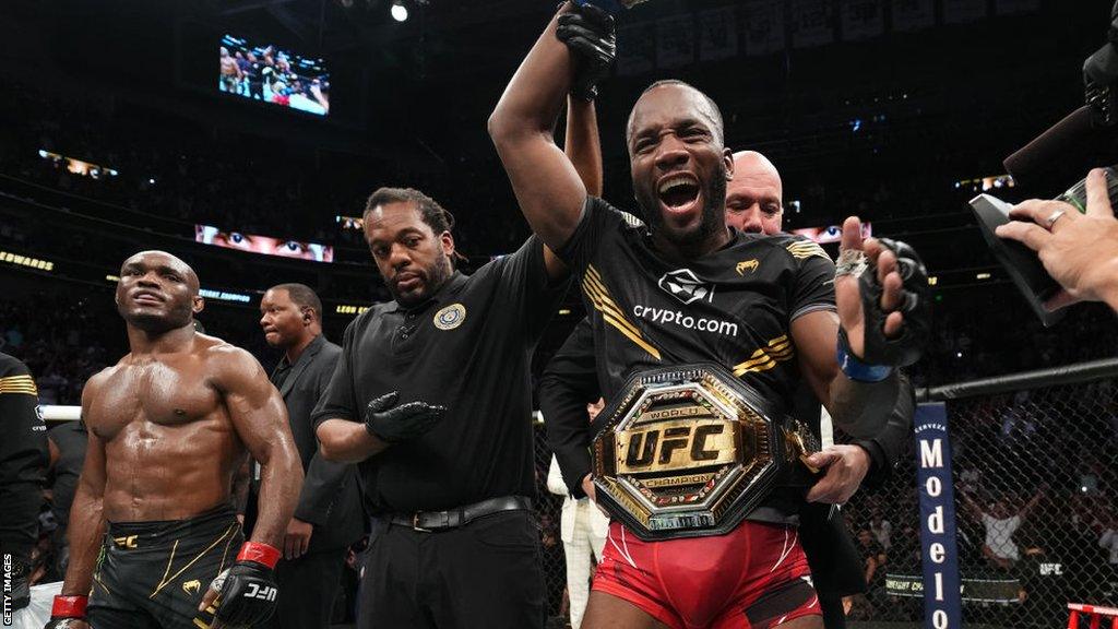 Leon Edwards celebrates beating Kamaru Usman