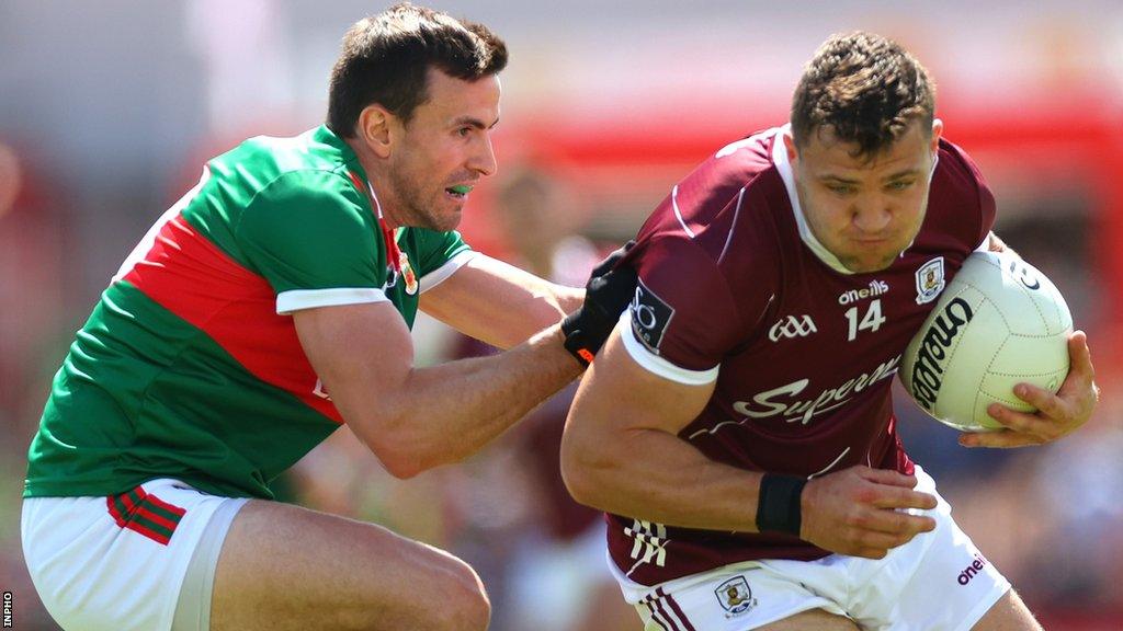 Galway's Damien Comer attempts to get away from Mayo's Jason Doherty in Salthill