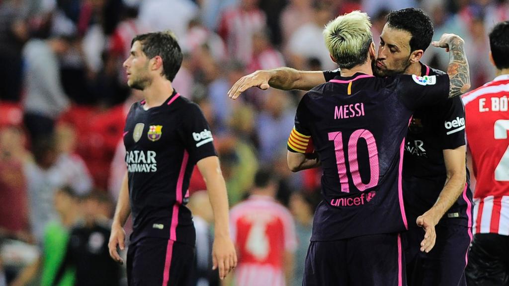 Barcelona's Lionel Messi and Sergio Busquets