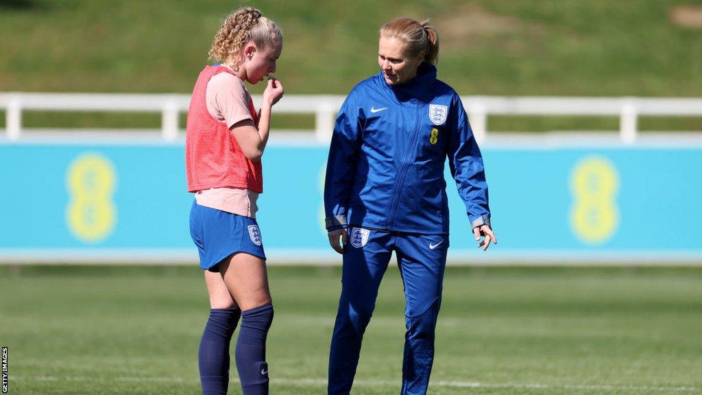 Sarina Wiegman and Katie Robinson in England training